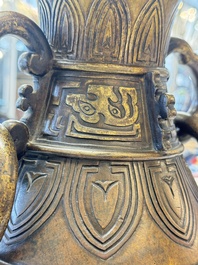 A fine and large Chinese archaistic gilt-bronze vase with handles, Ming