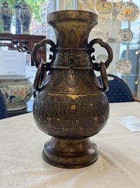 A fine and large Chinese archaistic gilt-bronze vase with handles, Ming