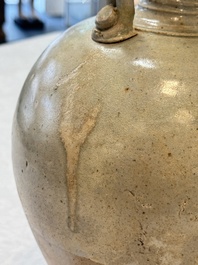A Chinese straw-glazed pottery amphora with double dragon-shaped handles, Tang