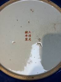 A large Chinese gilt-decorated powder-blue-ground 'Dragon' dish on a later wooden stand, Guangxu mark and of the period