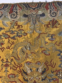 A Chinese yellow-ground kesi silk 'Dragon' panel, 18/19th C.