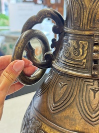 A fine and large Chinese archaistic gilt-bronze vase with handles, Ming