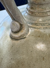 A Chinese straw-glazed pottery amphora with double dragon-shaped handles, Tang