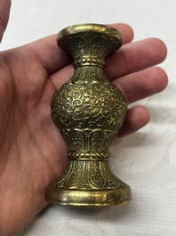 A small Chinese 'Lotus Scroll' incense tool vase, Qianlong mark, 18th C., and possibly of the period
