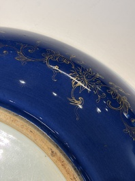 A large Chinese gilt-decorated powder-blue-ground 'Dragon' dish on a later wooden stand, Guangxu mark and of the period