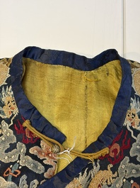 A Chinese imperial yellow-ground embroidered silk 'Nine Symbols' lady's 'Dragon' robe, 'Ji Fu' 吉服, 19th C.