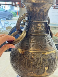 A fine and large Chinese archaistic gilt-bronze vase with handles, Ming