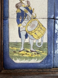 A framed six-piece 'Musicians' tile panel and two 'Landscape' tiles, France, 19th C.