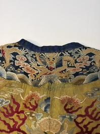 A Chinese imperial yellow-ground embroidered silk 'Nine Symbols' lady's 'Dragon' robe, 'Ji Fu' 吉服, 19th C.