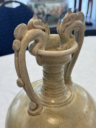 A Chinese straw-glazed pottery amphora with double dragon-shaped handles, Tang
