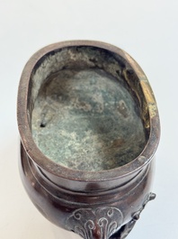 Two Chinese bronze censers, one with a wooden cover,  Ti An 惕庵 mark, 19th C.