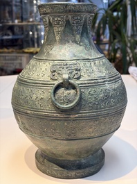 An extremely rare Chinese archaic bronze wine vessel, 'Hu 壺', Warring States period