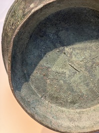 An extremely rare Chinese archaic bronze wine vessel, 'Hu 壺', Warring States period