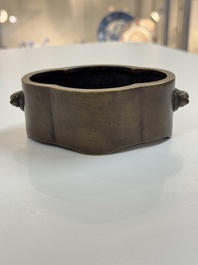 Two Chinese bronze censers, one with a wooden cover,  Ti An 惕庵 mark, 19th C.