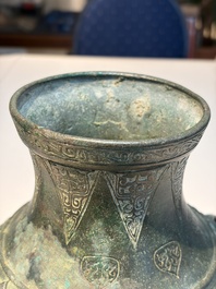 An extremely rare Chinese archaic bronze wine vessel, 'Hu 壺', Warring States period