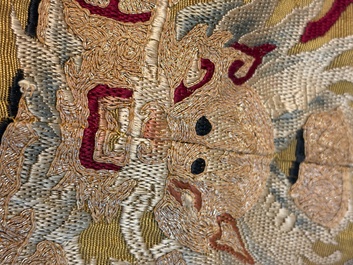 A Chinese imperial yellow-ground embroidered silk 'Nine Symbols' lady's 'Dragon' robe, 'Ji Fu' 吉服, 19th C.