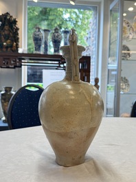 A Chinese straw-glazed pottery amphora with double dragon-shaped handles, Tang