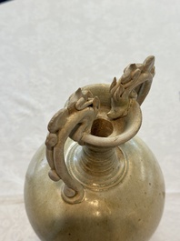 A Chinese straw-glazed pottery amphora with double dragon-shaped handles, Tang