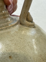 A Chinese straw-glazed pottery amphora with double dragon-shaped handles, Tang