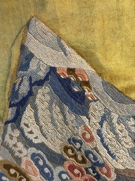 A Chinese imperial yellow-ground embroidered silk 'Nine Symbols' lady's 'Dragon' robe, 'Ji Fu' 吉服, 19th C.