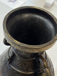 A fine and large Chinese archaistic gilt-bronze vase with handles, Ming