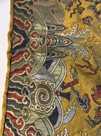 A Chinese yellow-ground kesi silk 'Dragon' panel, 18/19th C.