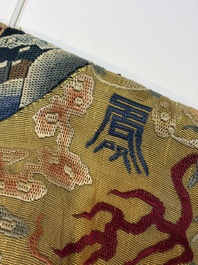 A Chinese imperial yellow-ground embroidered silk 'Nine Symbols' lady's 'Dragon' robe, 'Ji Fu' 吉服, 19th C.