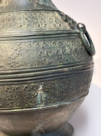 An extremely rare Chinese archaic bronze wine vessel, 'Hu 壺', Warring States period
