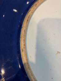 A large Chinese gilt-decorated powder-blue-ground 'Dragon' dish on a later wooden stand, Guangxu mark and of the period