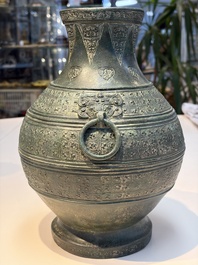 An extremely rare Chinese archaic bronze wine vessel, 'Hu 壺', Warring States period