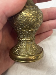 A small Chinese 'Lotus Scroll' incense tool vase, Qianlong mark, 18th C., and possibly of the period