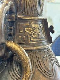 A fine and large Chinese archaistic gilt-bronze vase with handles, Ming