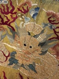 A Chinese imperial yellow-ground embroidered silk 'Nine Symbols' lady's 'Dragon' robe, 'Ji Fu' 吉服, 19th C.