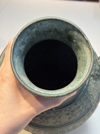 An extremely rare Chinese archaic bronze wine vessel, 'Hu 壺', Warring States period