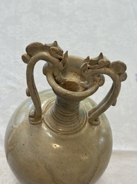 A Chinese straw-glazed pottery amphora with double dragon-shaped handles, Tang