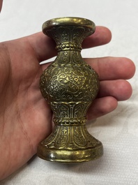 A small Chinese 'Lotus Scroll' incense tool vase, Qianlong mark, 18th C., and possibly of the period