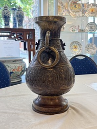 A fine and large Chinese archaistic gilt-bronze vase with handles, Ming