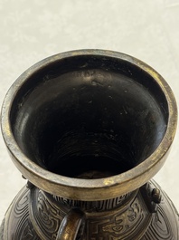 A fine and large Chinese archaistic gilt-bronze vase with handles, Ming