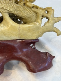 A fine Chinese carved soapstone 'Squirrels and Grapes' group and a 'Phoenixes among Peonies' group, 20th C.