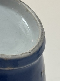 A rare pair of Japanese gilt-decorated blue-ground vases, Edo, late 17th C.