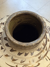 A large Chinese Cizhou ware slip-glazed wine jar, Ming