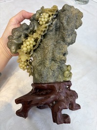 A fine Chinese carved soapstone 'Squirrels and Grapes' group and a 'Phoenixes among Peonies' group, 20th C.