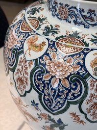 A large Dutch Delft cashmere palette vase with a phoenix and birds among flowers, ca. 1700