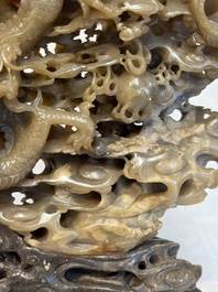 A fine Chinese carved soapstone 'Dragons among Clouds' group and a 'Phoenixes and Cranes' group, 20th C.