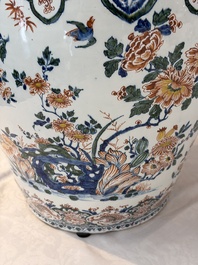 A large Dutch Delft cashmere palette vase with a phoenix and birds among flowers, ca. 1700