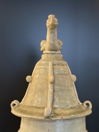 A large Chinese qingbai covered urn applied with immortals and a dragon, Northern Song