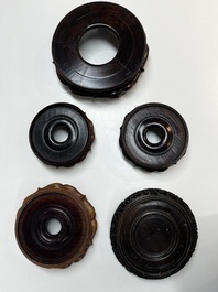 A collection of 20 Chinese wooden stands, 19/20th C.
