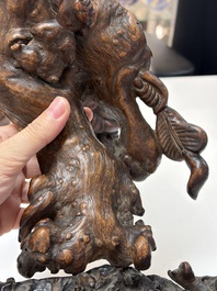 A group of 11 Chinese carved bamboo and wooden works, 19/20th C.