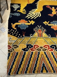 A Sino-Tibetan inscribed woollen 'Dragon' pillar carpet, 19th C.