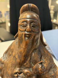 A group of 11 Chinese carved bamboo and wooden works, 19/20th C.